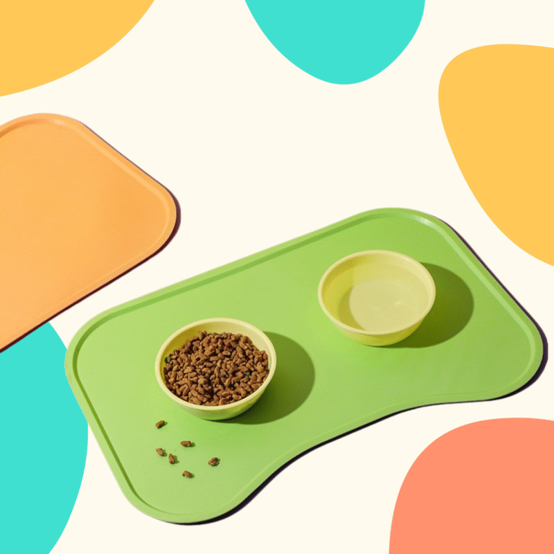 Waterproof silicone pet feeding mat with raised edges for food and water bowls