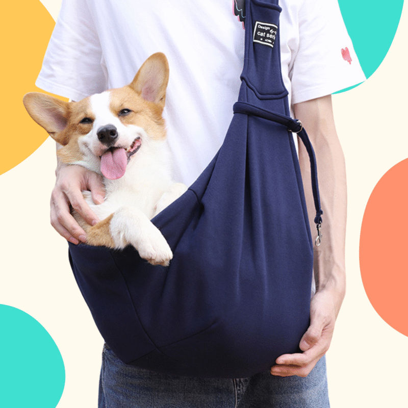 Adjustable pet shoulder bag carrier with dog inside, featuring safety buckle and storage pocket